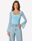 Light blue square-neck long-sleeve mesh bodysuit with bell cuffs and fitted waist.