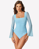 Light blue square-neck mesh bodysuit with long bell sleeves and high-cut leg.