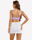 Lace underwire unlined bra in lilac, back view with adjustable straps and hook closure.