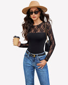 Lace long sleeve bodysuit in black with sheer floral lace sleeves, fitted bodice