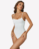 White sleeveless thong bodysuit with scoop neckline and minimal straps