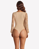 Beige lace puff-sleeve leotard back view with sheer lace sleeves