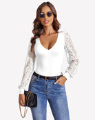 Double-lined lace leotard with V-neck and white puff sleeves
