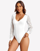 White double-lined lace leotard with V-neck puff sleeves, high-cut leg