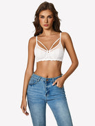 White underwire lace floral crossover bra with crisscross straps and scalloped trim