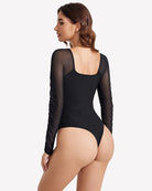 Black long sleeve mesh bodysuit with scooped back and ruched front