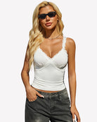 White lace tank top with deep V neckline and scalloped trim