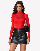 Red long-sleeve mesh bodysuit with high neckline and sheer chest panel