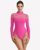 Long-sleeve turtle neck leotard in bright pink with sheer side panels