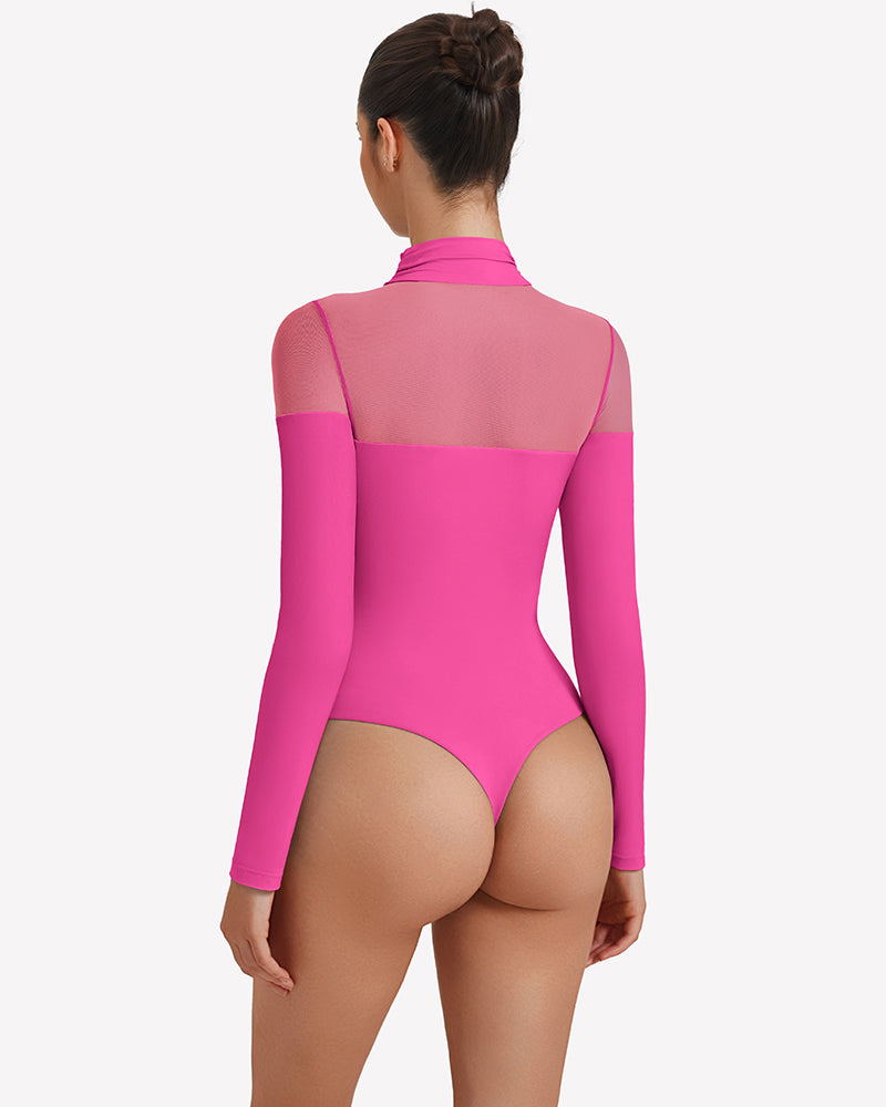 Long-sleeve turtle neck leotard in bright pink, back view with sheer side panels