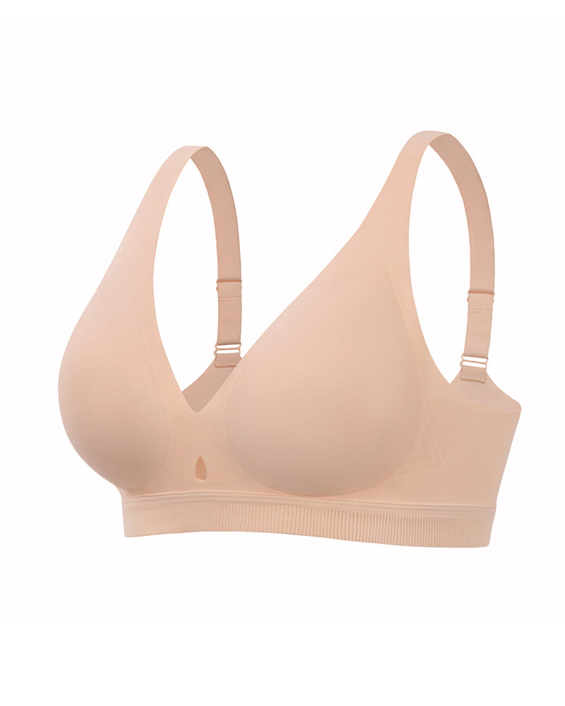 Wireless no-underwire bra in nude, V-neck wireless cups with adjustable straps.