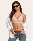 Wireless no-underwire bra in light pink, deep V neckline and wide ribbed underband.