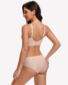 Nude back-view wireless push-up bra with adjustable straps and matching briefs