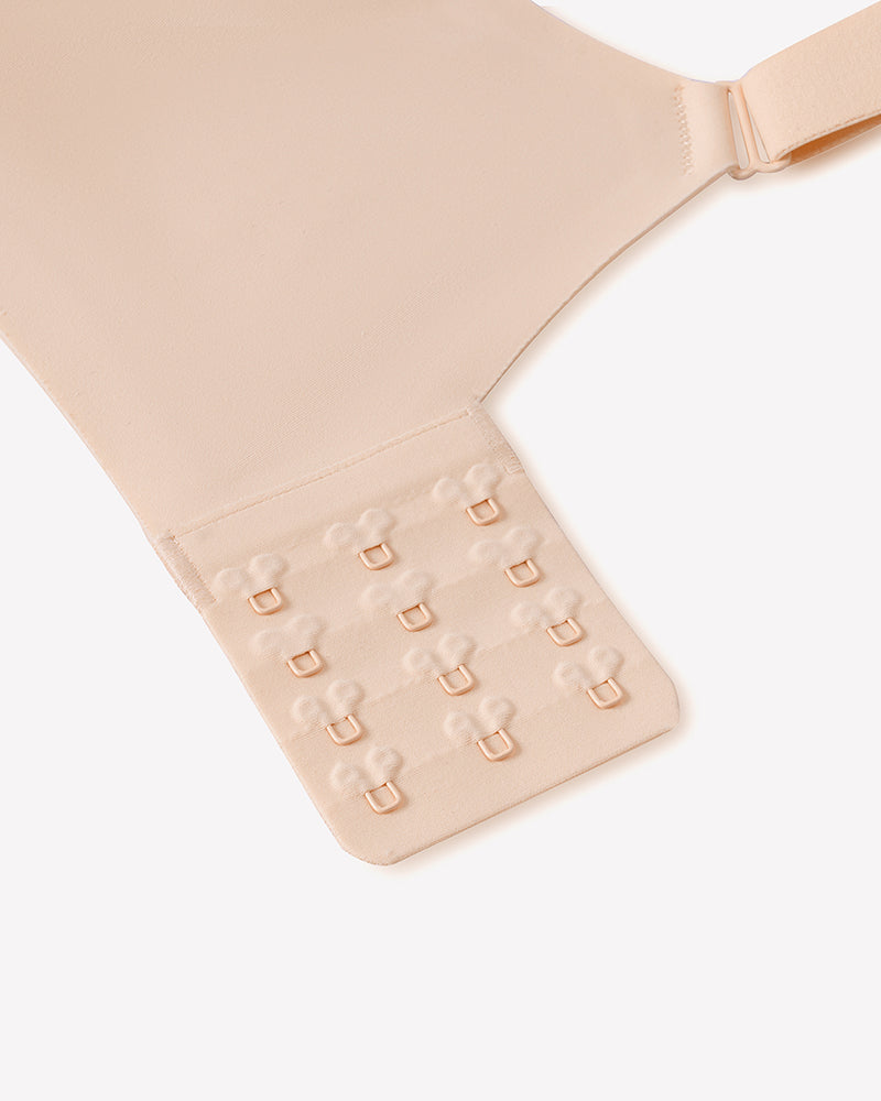 Beige bra back band with multiple hook-and-eye closure rows