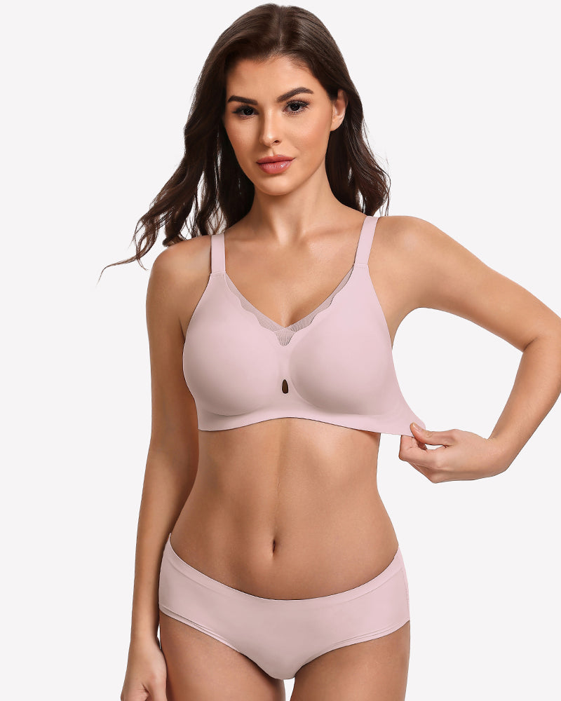 Seamless full coverage bra, pale pink, front view with adjustable spaghetti straps