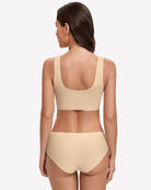 Wireless seamless no-underwire bra set in nude beige, back view with racerback straps