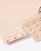 Seamless push-up comfort bra back band in nude with hook-and-eye closure and straps