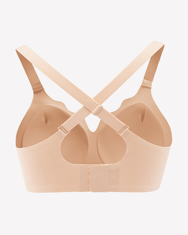 Beige wireless seamless bra with crisscross back straps and adjustable closure