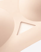 Nude mesh padded bralette close-up of triangular mesh insert and smooth cups