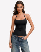 Black double-lined halter crop tank top with scoop neckline and ruched fit