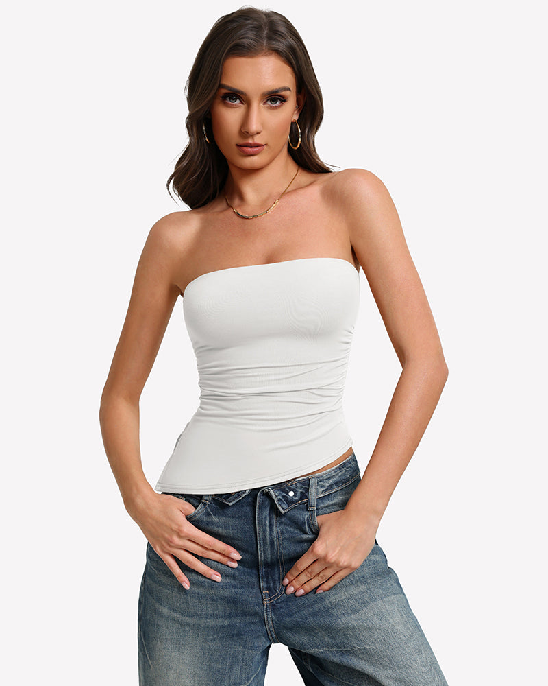 White strapless tube top with ruched fabric and smooth fitted silhouette