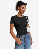 Black short-sleeve snap bodysuit, scoop neck, fitted one-piece leotard.