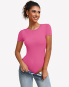 Short-sleeve snap bodysuit, bright pink with fitted long torso and thong-style bottom.