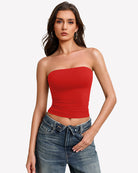 Red bandeau tube top with ruched sides and double-lined strapless coverage.