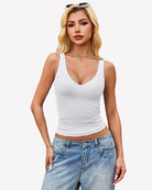 Double-lined plunge V-neck tank top in white, sleeveless with deep V neckline