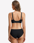 Wireless seamless bralette in black, back view with adjustable straps and smooth band.