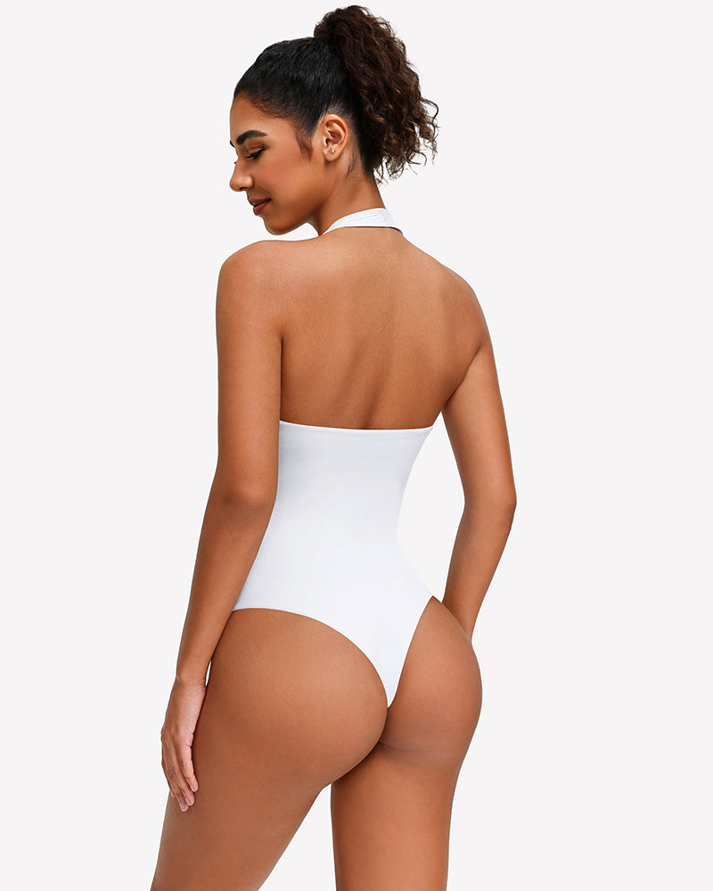 White backless halter bodysuit with open back and high-cut leg