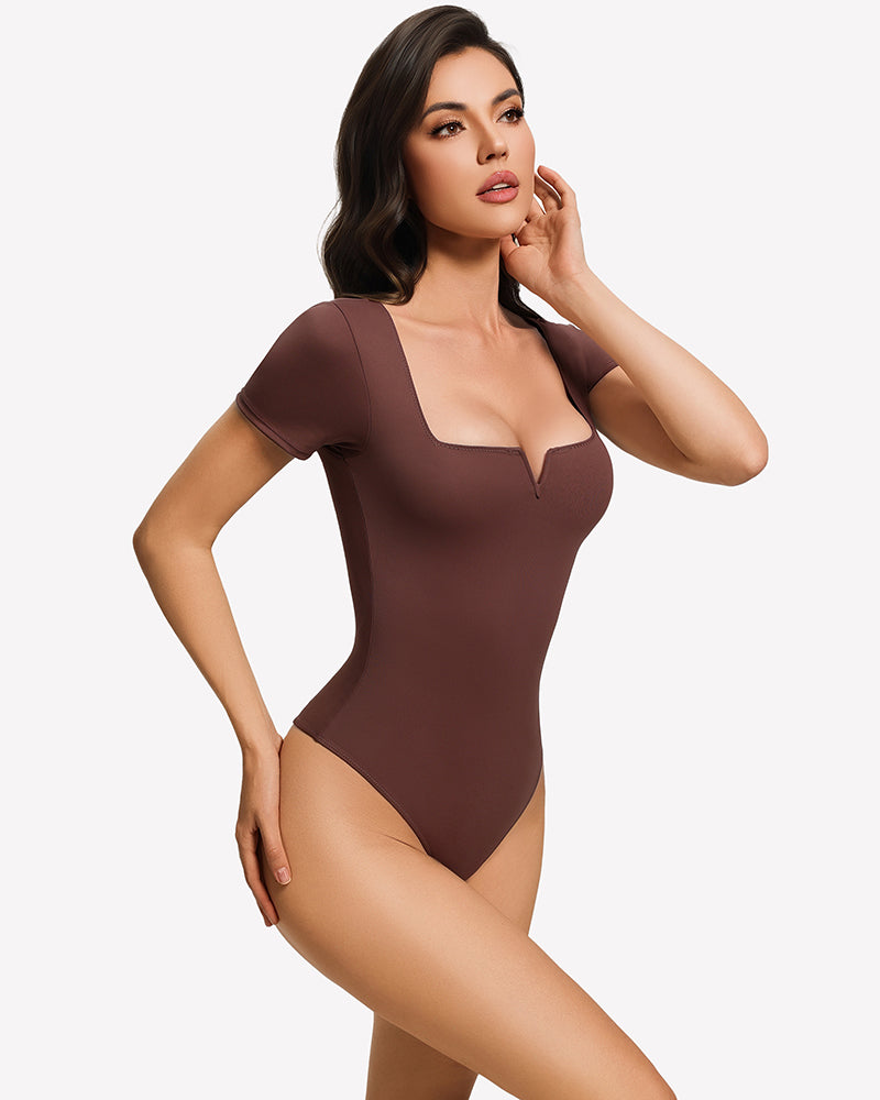 Burgundy square-neck short-sleeve bodysuit, fitted one-piece with curved leg cut