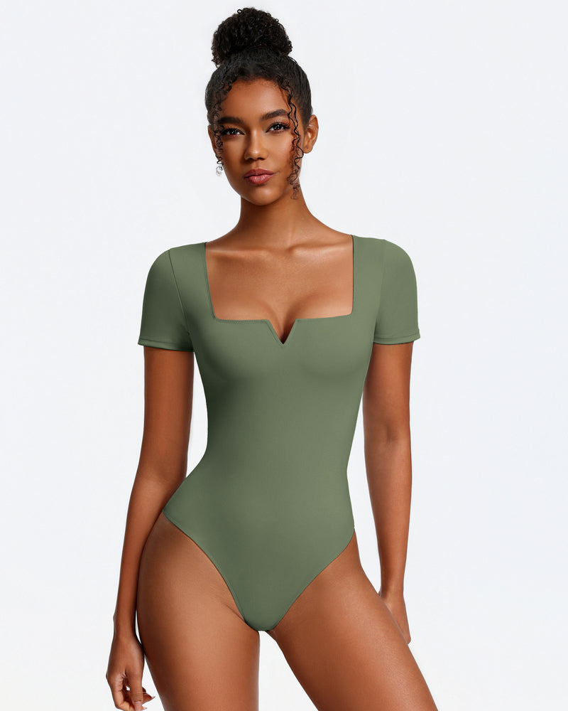 Olive green short-sleeve square-neck bodysuit, fitted one-piece with thong bottom.