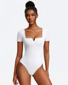 White short-sleeve square-neck bodysuit, fitted one-piece with thong bottom.