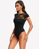 Black lace crew neck short sleeve thong bodysuit with lace yoke and high-cut