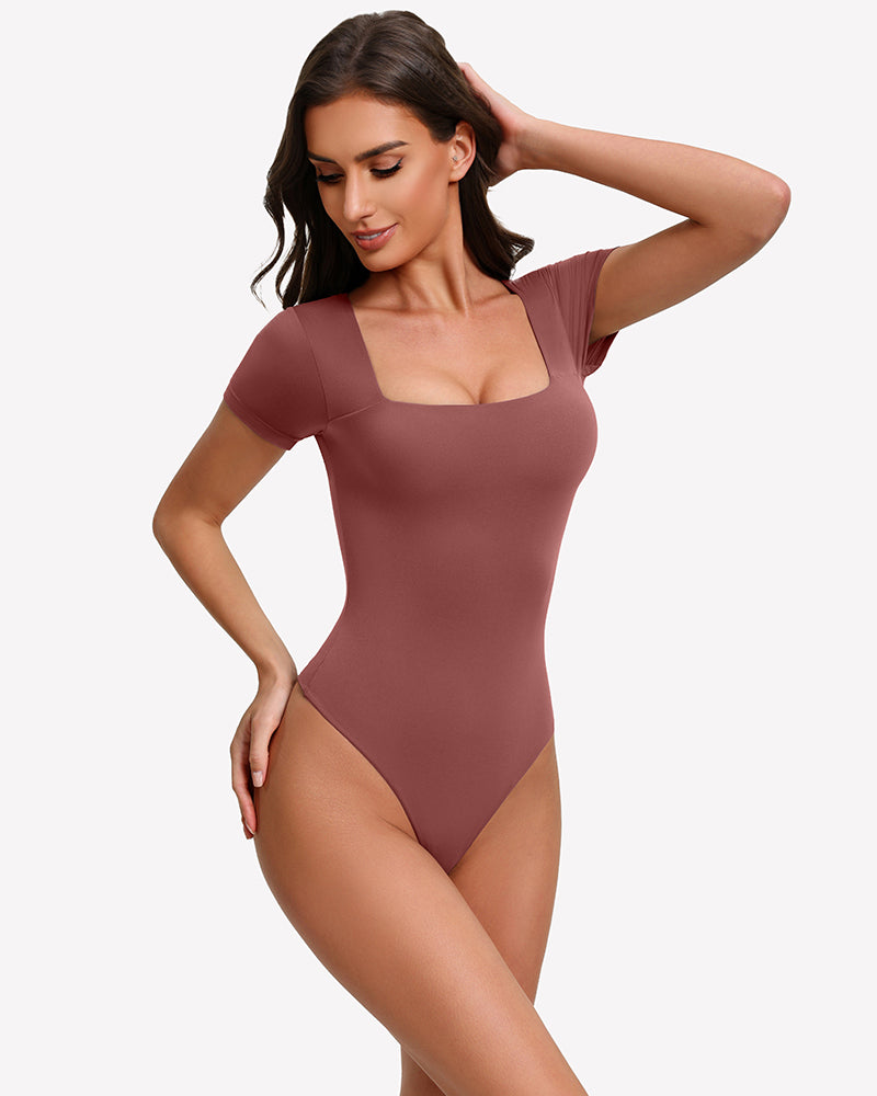 Square-neck short-sleeve bodysuit in brown, fitted one-piece with thong-style leg openings.