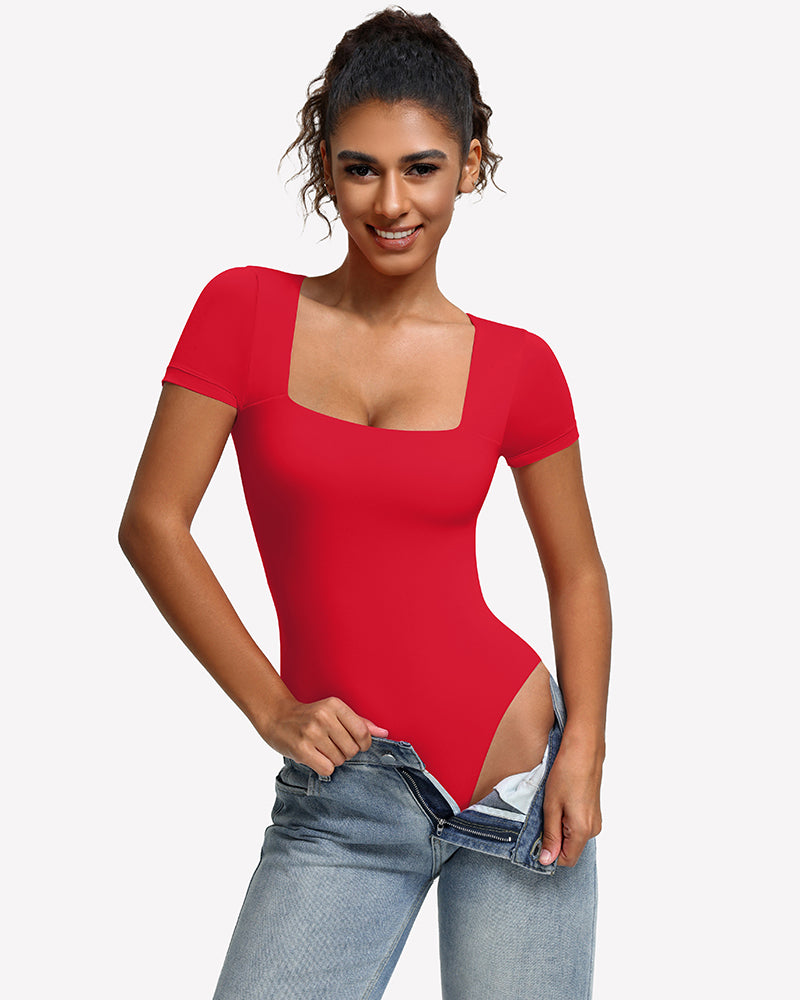 Red short-sleeve square-neck bodysuit, front view with jeans waistband