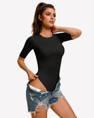 Black fitted crew-neck bodysuit with 3/4 sleeves, snap closure, full-coverage cut