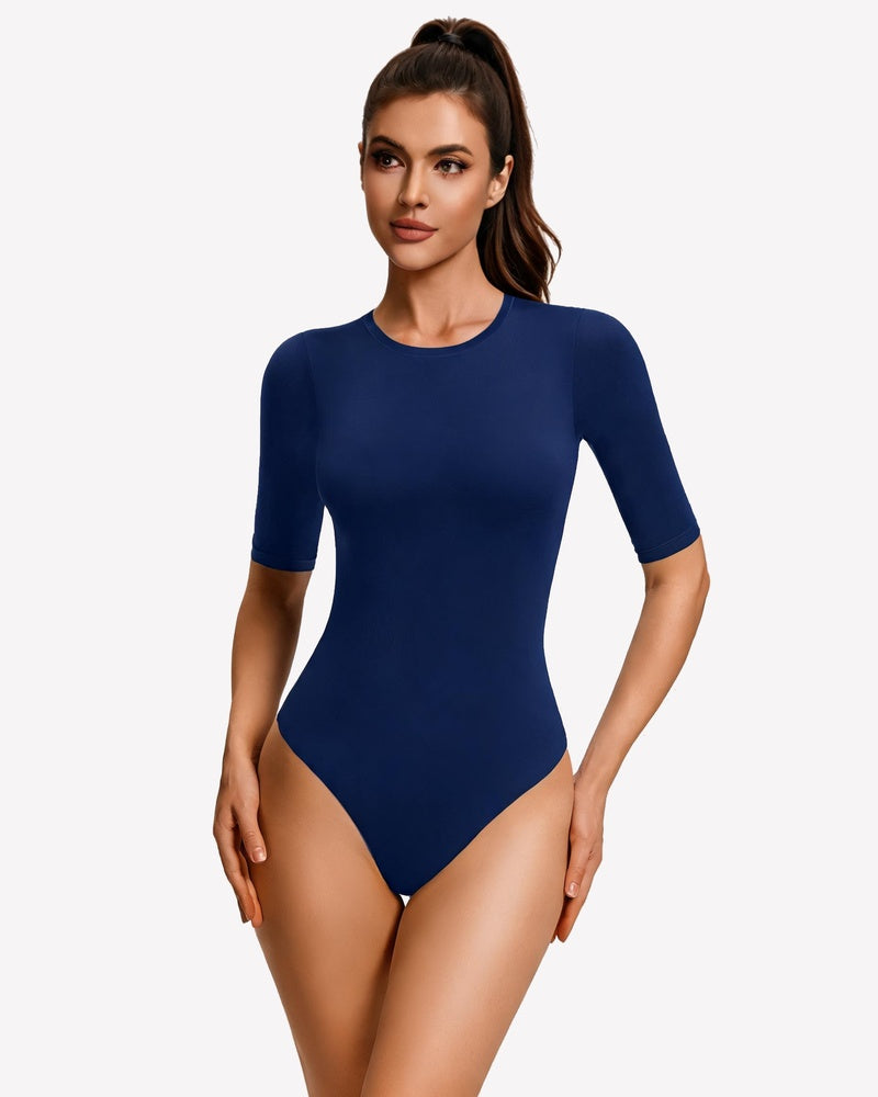 Navy blue fitted crew-neck bodysuit with 3/4 sleeves and snap closure