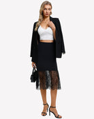 Black lace half slip underskirt with wide lace ruffle at hem.