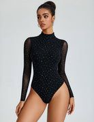 Black mesh mock neck long-sleeve bodysuit with sheer sleeves and speckled dots