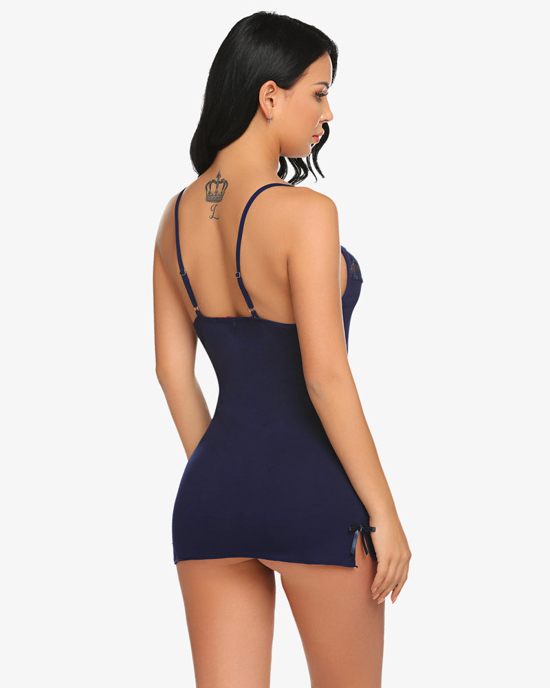 Navy lace-trim slip chemise with spaghetti straps, open back, and tie sides