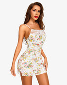 White floral lace-trim slip chemise with spaghetti straps and short fitted hem