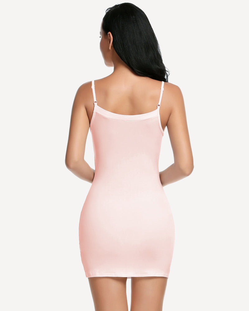 Back view of pink mini slip dress shapewear with thin spaghetti straps