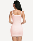 Back view of pink mini slip dress shapewear with thin spaghetti straps
