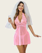Pink lace halter babydoll dress with plunging V-neck and sheer, flared skirt