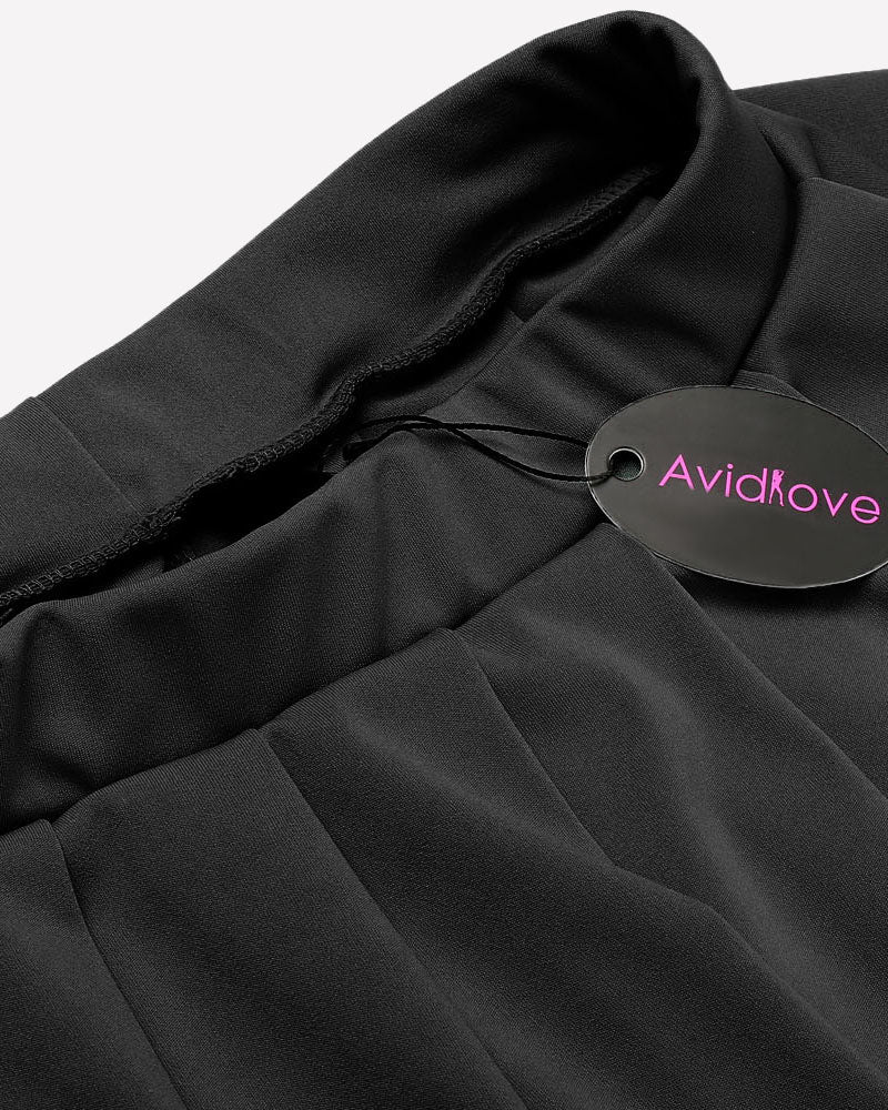 Black pleated skirt detail with fabric drape and AvidLove tag.