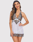 White lace babydoll chemise with halter neckline, bow detail, and dark lace trim