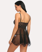 Black lace mesh babydoll nightgown viewed from back, sheer skirt with layered hem