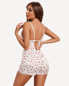 White lace satin pajama set with red heart print, open-back camisole and matching shorts